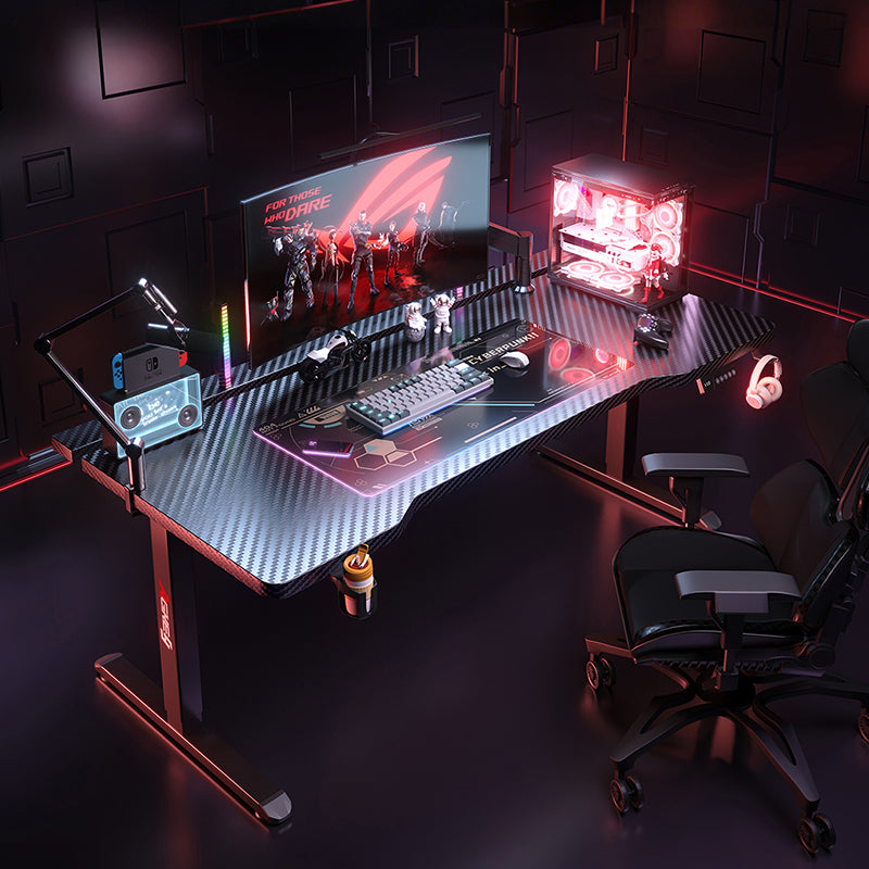 AGKey K1 Black electric standing desk with carbon fiber desktop in modern professional workspace setup with ergonomic chair