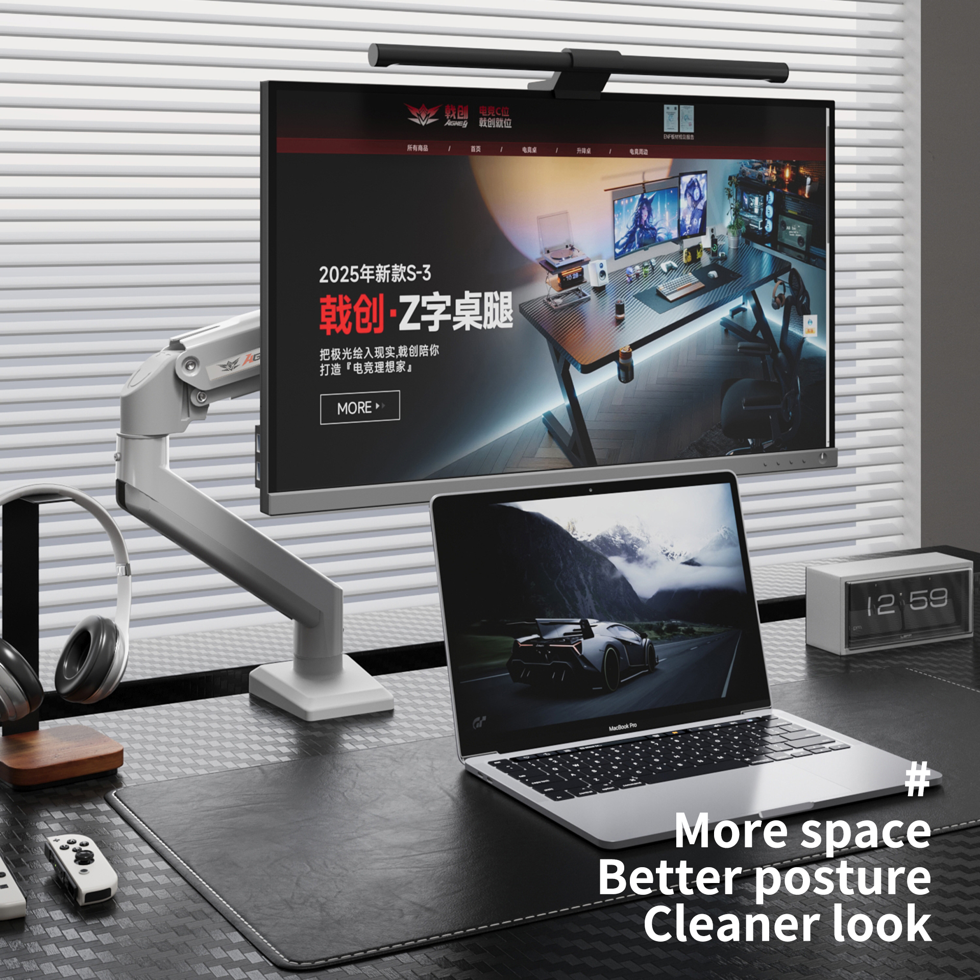 Black M1 monitor arm mounted on desk holding a widescreen monitor above a laptop with an ergonomic workspace setup