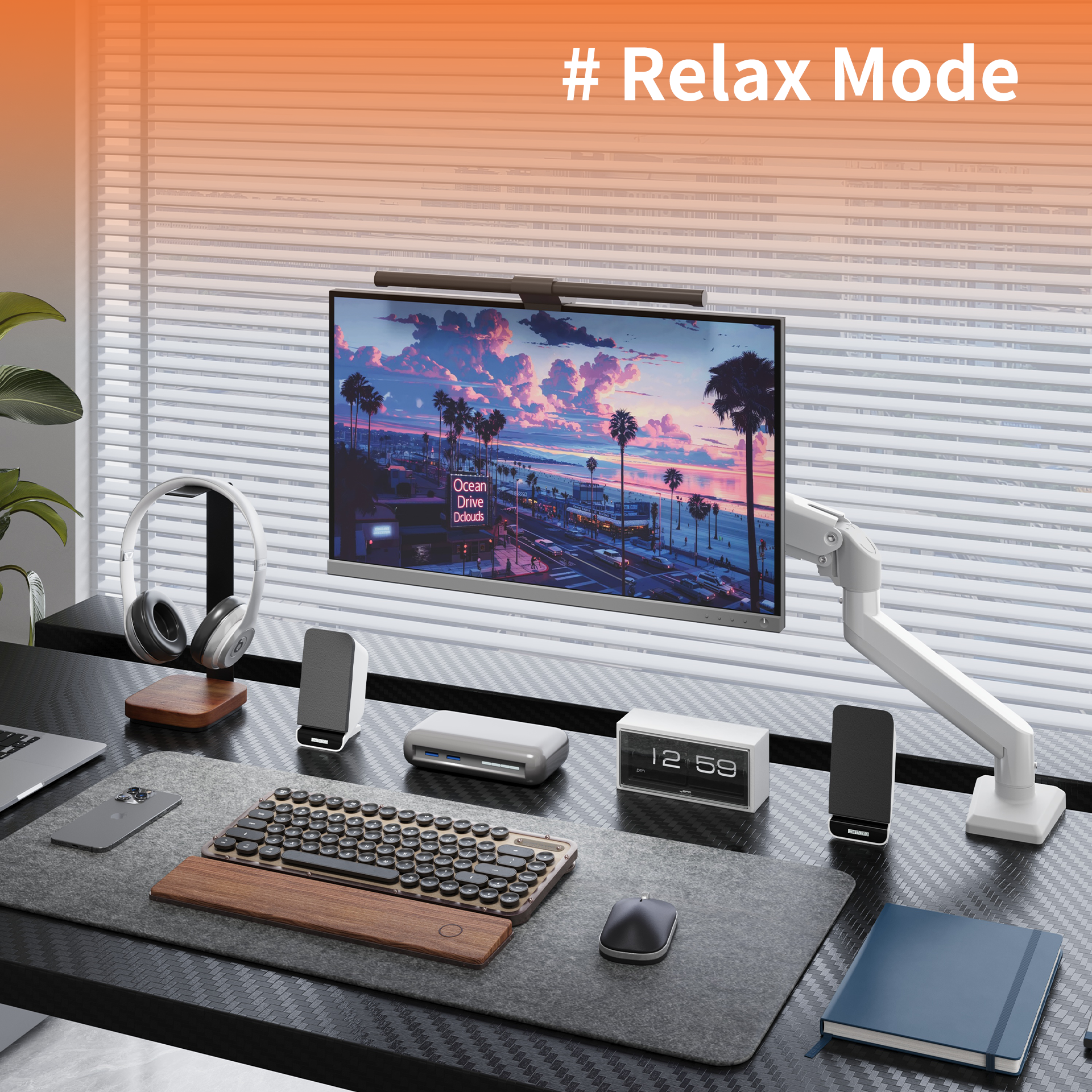 White M1 Monitor Arm holding a widescreen monitor displaying a sunset beach scene on a modern desk setup