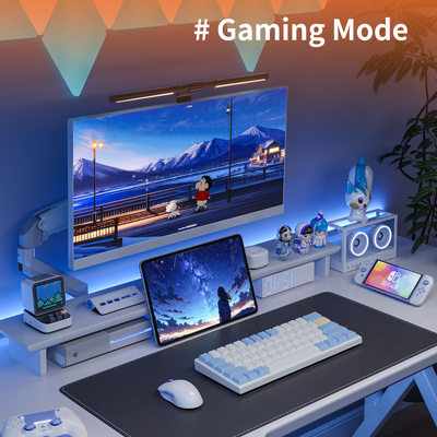 Black M1 monitor arm supporting a widescreen display with gaming setup and ambient blue LED lighting.