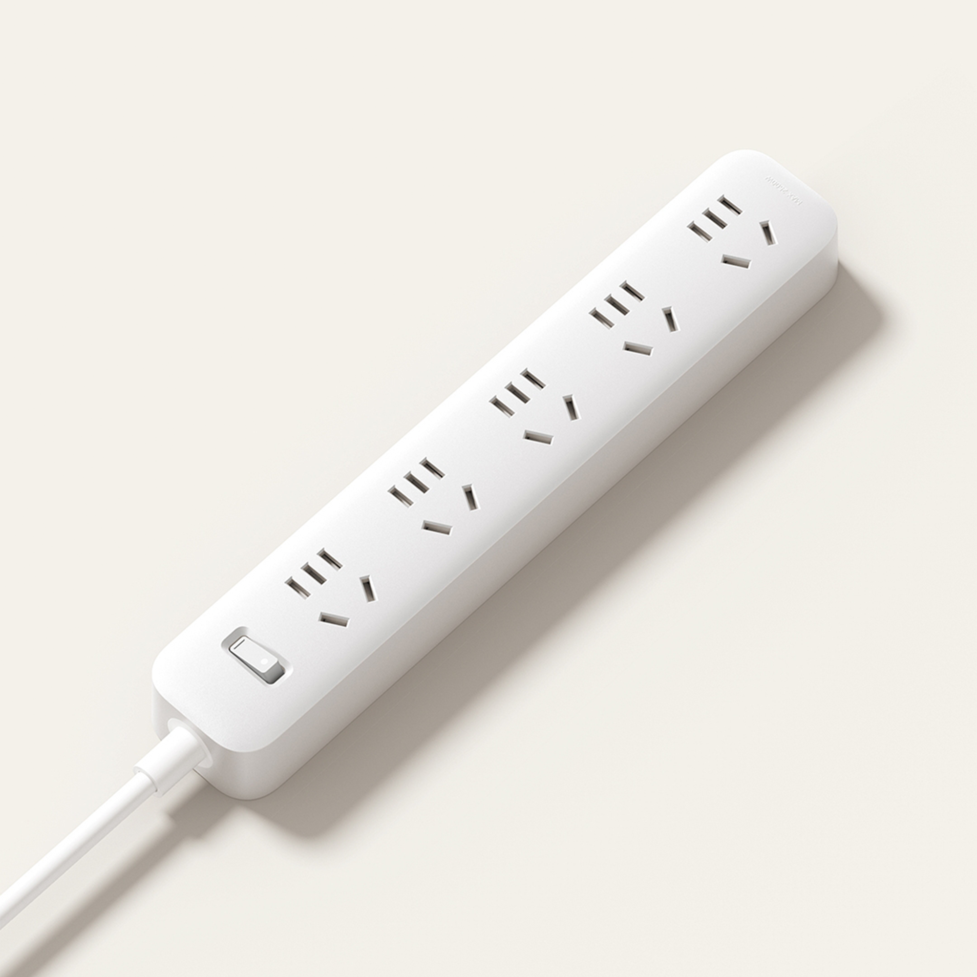 White Xiaomi power strip with 5 multi-standard outlets and a single master power switch.