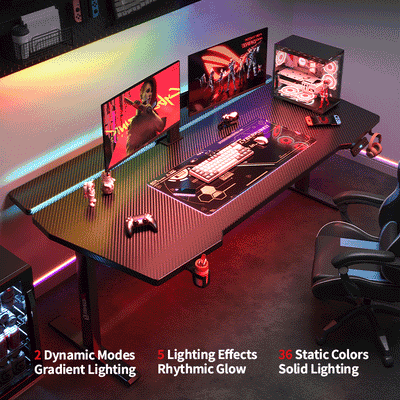 K2 Dual Motor Standing Desk in black textured surface with RGB lighting, dual monitors, gaming setup, and ergonomic chair