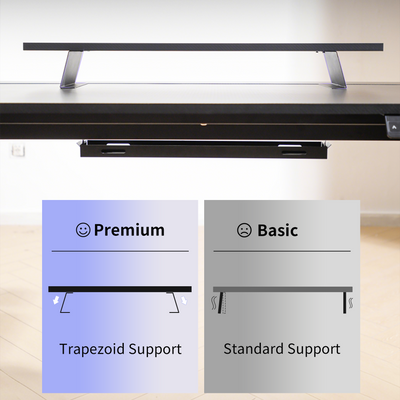 Black D1 Desk Monitor Riser with trapezoid metal support frame on a light wood floor background